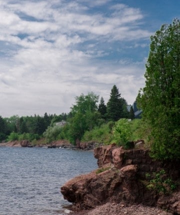 A rocky shoreline near a body of water.